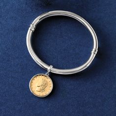 Ross-Simons - Italian Genuine Lira Coin Charm Bangle Bracelet in Silver. 8". Here's a contemporary bracelet with vintage charm. Our leading Milan-based designer is keeping Italy's historic currency in demand by preserving genuine, retired lira coins in highly collectible specialty jewelry. Here, a lira coin charm dangles with a sterling silver bezel and bangle. Finished with white rhodium for tarnish resistance. Figure 8 safety. Hinged. Lira coin charm bangle bracelet. Contemporary Bracelets, Bracelet In Silver, Figure 8, Bangle Bracelets With Charms, Charm Bangle, Vintage Charms, Bangle Bracelet, Bangle Bracelets, Milan