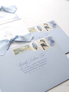 curated vintage stamps on blue envelope with printed address Invitation Decoration Ideas, South Of France Wedding Invitation, Luxury Wedding Invitation Suite, Coastal Chic Wedding Invitations, Diy Wedding Invitation Suite, Wedding Invitation Envelope Liner, French Blue Wedding Invitations, Wedding Invites Blue, Wedding Invitation Envelope Ideas