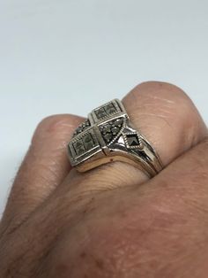 Vintage ring surrounded by Swiss cut fine Marcasite Sterling silver Size 7 can be sized by my jeweler. His service charge is $10-$20 Please request a quote. All rings are shipped free in the US in a nice gift box. Check out our over a THOUSAND great reviews Engraving is $4 per letter and is not always perfect depending on the piece. It can take a few days if the jeweler is busy. This is payable to Paypal Judithsltd@gmail.com Vintage Silver Diamond Ring With Gemstone, Vintage Silver Diamond Ring With Accent Stones, Classic Marcasite Jewelry For Anniversary, Vintage Sterling Silver Rings With Diamond Accents, Antique Silver Cluster Ring As Gift, Marcasite Gemstone Ring For Anniversary, Marcasite Ring For Anniversary, Vintage Silver Cluster Ring With Diamond Accents, Marcasite Anniversary Rings Stamped 925