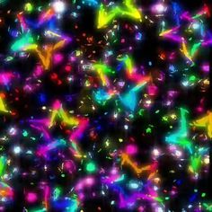 many different colored stars are in the dark