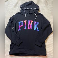 Black Hoodie With The Dye Writing. Has Pink Written Around Hood. Never Worn, No Tags. Fits Big. Pink Hoodie With Adjustable Hood For Fall, Fall Pink Hoodie With Adjustable Hood, Trendy Pink Hoodie For Sports, Trendy Pink Sports Hoodie, Trendy Pink Hoodie With Adjustable Hood, Pink Fall Hoodie With Adjustable Hood, Pink Sweatshirt With Adjustable Hood For Winter, Trendy Pink Fleece Outerwear, Pink Sweatshirt With Adjustable Hood For Sports