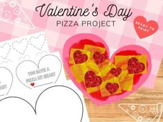 valentine's day pizza project with hearts and paper cut outs on a wooden table