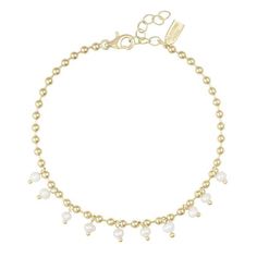 The pearly anklet features dainty pearls all across the chain for an effortlessly glam summer look.    - 14kt gold plated  - 3.5mm freshwater pearls  - 8.5" with 1.5" extender Vintage Assemblage Jewelry, Vintage Assemblage, Rose Lily, Caged Sandals, Gold Anklet, Assemblage Jewelry, Black Aviators, Black Tank Dress, Four Horsemen