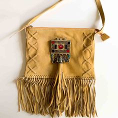 The Suede Festival Fringe Bag Will Go Anywhere You Go! Festivals, Clubs, Parties, And Any Adventure Under The Stars. Pairs Perfectly With Your Boho Style From Dresses To Jeans To Your Favorite Kimono. Embellished With Vintage Adornments, Suede Fringe And Tassel. So Fun! New Without Tags Suede Lined Inside Zipper Closure With Suede Pull One Zipper Pocket Inside 10" Wide X 7 3/4" Tall 6" Fringe 22 1/2" Strap Drop Length Saint Laurent Purse, Lv Multi Pochette, Side Purses, Fringe Crossbody Bag, Fringe Festival, Brown Wallet, Fringe Bags, Black Leather Crossbody Bag, Crossbody Tote Bag