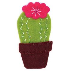 a green cactus with pink flowers in a red felt pot on a white background,