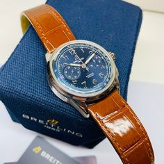 Excellent Condition. Almost Indistinguishable from New. includes All Original Boxes, Papers, Hang Tag, Bezel Protector, Digital Warranty Card from Breitling. 1 Owner Watch COSC 4606742 AB1510 Paying homage to three generations of inventors – Léon, Gaston & Willy Breitling – the Premier Duograph displays Breitling’s watchmaking expertise with its split second complication. As Willy Breitling said, the Premier is an “unmistakable stamp of impeccable taste”. This latest generation of Premier chrono Classic Blue Chronograph Watch For Formal Occasions, Designer Watch Accessories With Polished Finish For Business, Designer Brown Watch Accessories For Formal Occasions, Blue Chronograph Watch For Formal Occasions, Designer Brown Watch For Business, Luxury Leather Office Watch, Elegant Blue Chronograph Watch For Business, Elegant Brown Chronograph Watch As A Gift, Designer Leather Watch Accessories For Formal Occasion