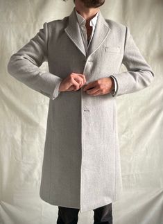 Discounted 15% -- Sample garment (typically Made to Measure) -- Original Price: $795 Approximately size Large / 40/42.  Designed in California. Made by hand in Nepal. Classic Long Winter Blazer, Elegant Gray Pea Coat With Pockets, Luxury Single Breasted Gray Outerwear, Long Formal Outerwear With Pockets, Formal Long Outerwear With Pockets, Luxury Gray Single Breasted Outerwear, Luxury Single-breasted Gray Outerwear, Luxury Gray Long Sleeve Outerwear, Luxury Gray Single-breasted Outerwear