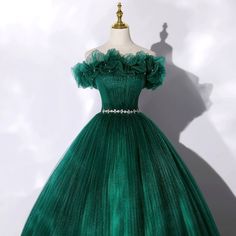 Embrace a vision of enchantment with our Gothic Emerald Green Tulle Wedding Dress, featuring a stunning Layered Ruffle Neckline. This dress epitomizes bridal beauty with its opulent tulle construction that creates a dramatic, full-bodied silhouette. The lush layers of ruffles at the neckline provide a soft, romantic fr Prom Dress Green, Off Shoulder Tulle, Sweet 16 Dress, Green Tulle, 16 Dress, Corset Dress Prom, Long Prom Gowns, Graduation Dresses, فستان سهرة