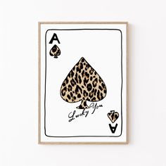 an ace card with leopard print on it