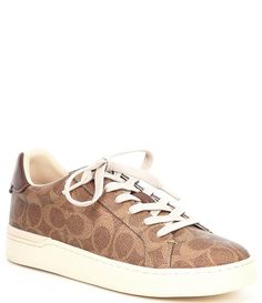 From COACH&#x2C; the Lowline C Logo Print Canvas Sneakers feature:C logo print coated canvas upperLace-up closureFine mesh liningRubber outsoleFlat heelImported. Coach Sneakers, C Logo, Print Coat, Dream Shoes, Coach Shoes, Canvas Sneakers, Dillard's, Golden Goose Sneaker, Logo Print