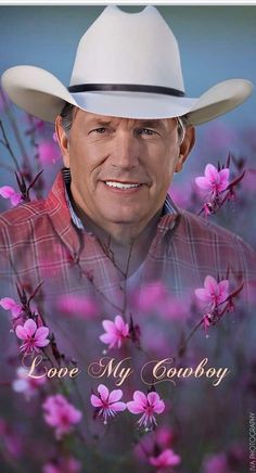 a man wearing a cowboy hat with pink flowers in front of him and the words lone my cowboy on it