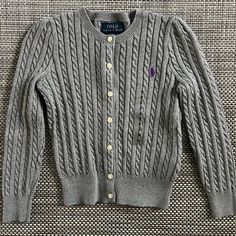 New Girl's "Polo Ralph Lauren" Grey Cable Knit Sweater, Signature Rl Purple Pony, Size: 5, Made In Cambodia Long Sleeve Purple Cable Knit Cardigan, Purple Long Sleeve Cable Knit Cardigan, Classic Purple Winter Tops, Outfits With Grey Cardigan, Lauren Grey, Blue Cable Knit Sweater, Grey Cable Knit Sweater, Varsity Sweater, Toddler Sweater