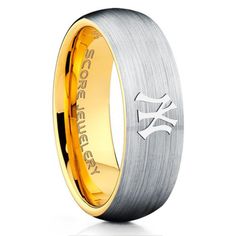 men's wedding band with two tone gold and silver inlays, engraved on the side