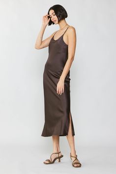 This luxe, mid-length slip dress has that alluring '90s minimalist look down pat. From that sexy little slit to the way it glides along the contours of the body, it's designed to make you feel like the goddess you are. •Adjustable shoulder straps •Bias cut •Side slit •Midi length DIMENSIONS •Standard: 46" Length Item number: 2090363 100% Silk Dry Clean The Goddess, Cami Dress, Item Number, Mid Length, Make You Feel, Midi Length, Shoulder Straps, Feel Like, Spaghetti Strap