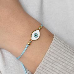 Discover the protective power of an evil blue eye bracelet. Choose from Greek Mati, Turkish Eye, and more for stylish defense. Wearing an evil blue eye bracelet is more than just a fashion statement; it's a symbol of protection against negative energy and ill intentions. The concept of the evil eye, also known as "mati" in Greek culture, dates back thousands of years and is deeply rooted in various cultures around the world. The evil eye bracelet, adorned with a mesmerizing blue eye, is believed Blue Resizable Spiritual Evil Eye Bracelet, Turquoise Evil Eye Bracelet As Gift, Blue Evil Eye Bracelet Gift, Symbolic Evil Eye Bracelet For Friendship, Blue Evil Eye Bracelets, Adjustable Turquoise Bracelets With Evil Eye, Adjustable Turquoise Evil Eye Bracelet, Handmade Blue Evil Eye Bracelet, Blue Eye Bracelet