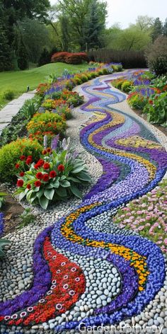 a garden path made out of rocks and flowers