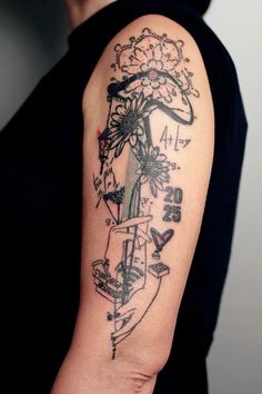 a person with a tattoo on their arm