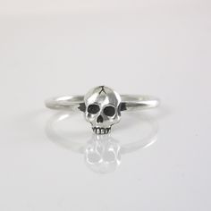 Mini Skull Ring ~ Hand made to order ~ Sized to order - if you need an additional size please specify the size in a note during checkout ~ Sterling Silver ~ Stamped with Artist Signature and .925 ~ Please allow 5-10 business days to make ring before shipping  ~Thank You! Make Ring, Artist Signature, Ring Hand, Rose Gift, Rose Ring, Star Ring, Skull Ring, Silver Rings Handmade, Ring Sterling Silver