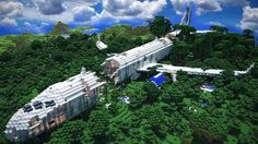 an airplane is flying over a large building in the middle of some trees and bushes