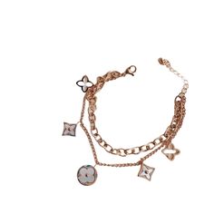 Elevate your style with the SHEREE Stainless Steel Charm Bracelet. Perfectly designed with monogram charms, this bracelet exudes elegance and adds a touch of personalization to your look. Made with high-quality stainless steel, this designer-inspired piece is a must-have for any fashion-forward individual. Luxury Elegant Charm Bracelet With Dangling Charms, Luxury Classic Polished Charm Bracelet, Luxury Sterling Silver Charm Bracelet In Yellow Gold Tone, Metal Bracelet With Logo Charm, Silver Chain Bracelet With Logo Charm As A Gift, Luxury Metal Chain Charm Bracelet, Trendy Metal Charm Bracelet Round, Elegant Metal Chain Bracelet With Logo Charm, Trendy Round Metal Charm Bracelet