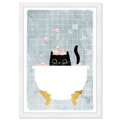 a black cat sitting in a bathtub with bubbles