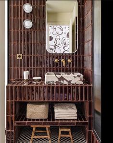 the bathroom is decorated in brown and white