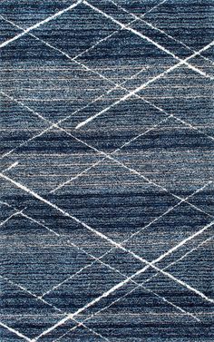 a blue rug with white lines on it