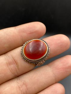 Old Ethnic Afghani Red Agate With Silver Ring Size : 8 US Ring Weight : 10.3 grams Antique Round Rings With Natural Stones, Antique Rings With Natural Stones, Bohemian Carved Round Ring, Traditional Cabochon Rings For Collectors, Bohemian Oval Agate Rings, Traditional Oval Carnelian Rings, Red Oval Rings With Natural Stones, Bohemian Carved Ring, Red Carved Vintage Rings