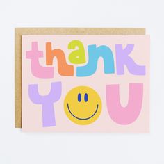 a thank you card with the words thank you written in multicolored letters and a smiley face