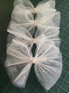 These beautiful white tulle butterfly hair bow with barrette are great for any occasions, birthday party, wedding, easter, holidays. Handmade unique hair accessory for girl and to women. 🌸Details may appear larger in photos. 🌸Hair bow clip size - L 5 inches, W 5 inches. 🌸Shipping & Handling 🌸 🌸Free shipping! 🌸🌸Ships The Next Day! * This item is already made and ready to ship * I will try my best to ship your piece as soon as I can. * Packages are typically shipped within 24hrs and ships domestically via USPS Grand advantage mail 2-5 business days with tracking, unless shipping has been upgraded. ♥♥Warning  ♥♥Please note keep out of the reach of infants and small children. Small parts are a choking hazard. Made by hand and with love.   Please contact with me if you have any questions Tulle Butterfly, Easter Wedding, Unique Hair Accessories, Bow Barrette, Unique Hair, Bow Clip, White Tulle, Girl Friend, Butterfly Hair