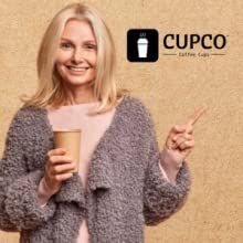 a woman holding a cup and pointing to the side