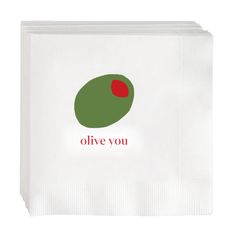 a white paper bag with an olive design on the front and red dot in the middle