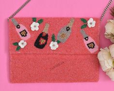 This luxury handbag made with high quality beads and cotton with classy Champagne Bottle design. And you are going to get many compliments from that people who knows the taste of luxury and handmade products 🌷 This bag is eye-catching with its handmade beads and goes well with traditional and modern outfits. You can use the purse/bag with or without the sling or chain. A heavy amount of natural beads is embroidered into the bag.  🌷 The luxury fashionable evening classy bags feature clutches an Pink Shoulder Bag With Handwork For Party, Pink Embellished Shoulder Bag For Party, Red Beaded Clutch For Party, Red Handcrafted Evening Bag For Party, Red Embellished Evening Bag For Party, Pink Beaded Clutch For Party, Glamorous Party Evening Bag With Handwork, Pink Beaded Party Clutch, Rectangular Beaded Shoulder Bag For Celebration