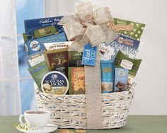 a white basket filled with tea and snacks