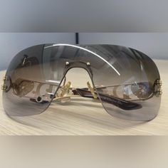 Authentic Vintage Christian Dior Spuns J5gjn 120 Shield Rimless Sunglasses - Gradient Black Lenses With Intricate Carving Of Brand In Metal On Arms- Previously Owned, Well Maintained Accessories Dior, Intricate Carving, Dior Accessories, Vintage Christian Dior, Rimless Sunglasses, Christian Dior, Sunglasses Accessories, Lenses, Dior