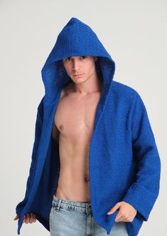 You will love this Men Cloak With Hood! A cloak in a color you won't find anywhere else. HIGH QUALITY FABRIC : Feel warmer than ever before and turn heads with bold, sparkly designs with a pair of Studio 54 Fashion Mens Hooded Cape Coat and be comfortable on how good you look! The fabric is completely handcrafted. FLATTERING RELAX CUT : These hooded festival duster kimono feature a strong silhouette and has a very cool hood!  VERY LONG LENGTH : Glitter Sparkle Kimonos length is 40 inches.  70S O Bohemian Blue Hooded Outerwear, Blue Bohemian Hooded Outerwear, Men Cloak, Bohemian Outfit Men, Studio 54 Fashion, Hooded Kimono, Kimono Men, Men Kimono, Cloak With Hood