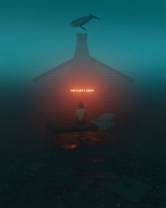 a person sitting on a bed in the fog