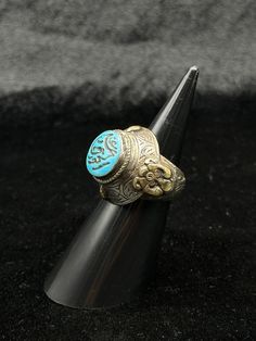 A Beautiful Antique Beautiful Silver Unique Ring With Islamic Writing On Turquoise Stone. Ring Size 9 US. Shipping Payment Feedback & Return Policy 1 : We ship Monday to Friday Via Airmail Register Insured  With Tracking # takes 2 to 4 Weeks to Destination. 2 : Contact us if you did not receive your item after 4 weeks. 3 : We Accept Payment From Most of the Mainstream Payment Methods. 4 : In Any Inconvenience Case we do Accept Return and full Refund. 5 : We Ship worldwide via Airmail Registered Spiritual Turquoise Ring Jewelry, Blue Bohemian Jewelry With Metal Ring, Bohemian Blue Jewelry With Metal Ring, Traditional Adjustable Turquoise Ring, Traditional Adjustable Turquoise Ring As Gift, Traditional Adjustable Turquoise Ring For Gift, Adjustable Traditional Turquoise Ring As Gift, Handmade Blue Turquoise Wedding Ring, Handmade Turquoise Ring For Wedding