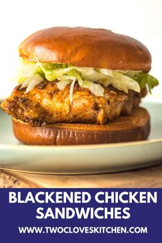 a chicken sandwich with lettuce and cole slaw