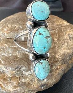 Masha Indian Native American Jewelry -On Route 66 - Albuquerque, New Mexico U.S.A Item Specifics          Stone : Turquoise, * Size : 8.5 * Top Measurements : 1.5" * Color : Blue, * Artisan : B Yazzie * SKU : 17639 * Free gift with Purchases (Till Stocks Last) Genuine Sterling Silver Jewelry This beautiful ring is made from all 925 Sterling Silver. These pieces are handmade by the artist creating the perfect balance of color and shine. Whether you are just starting out or are a serious collector you will not be disappointed with this work of art. Authenticity you can Trust We have been in this industry since 1972, all our Jewelry is Authentic Artisan Handcrafted Sterling Silver. It is Designed, Manufactured, Finished, Polished, and Assembled in the USA by Local Native American Artists with Unique Untreated Turquoise Ring, Southwestern Turquoise Ring With Natural Stones, Untreated Turquoise Ring, Untreated Oval Turquoise Ring, Turquoise Ring With Large Stone For Anniversary, Turquoise Anniversary Ring, Vintage Turquoise Ring With Natural Stones, New Mexico Usa, Albuquerque New Mexico