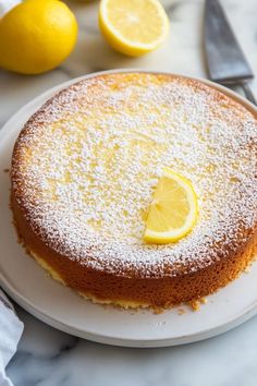 a lemon cake with powdered sugar on top