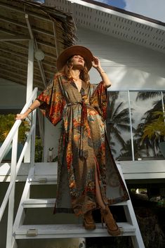 Special discount if you buy 2 items - 15% or 3 items 20%! Introducing our stunning Gray& Brown kimono, a part of our Shiva and Shakti couples' collection. This kimono is perfect for any occasion, whether you're attending a party or an evening reception in a restaurant, or simply lounging at home. The elegant design of this kimono allows it to be worn on its own or as a complement to any outfit. It's all about your mood and how you choose to accessorize. The original cut of this kimono is designed to create a visually slimming effect, emphasizing the waist and creating a flattering silhouette. The side slits add a touch of freedom, allowing you to move and dance with ease. Embody the spirit of Shakti, the Hindu goddess of feminine power, with our Shakti kimono. Its stunning design symbolize Silk V-neck Kimono For Daywear, Vintage Long Kimono For Vacation, Elegant Silk Kimono For Festivals, Silk V-neck Summer Robe, Vintage Silk Kimono For Summer, Summer Vintage Silk Kimono, Festive Long Kimono For The Beach, Silk Long Kimono For Loungewear, Festive Long Kimono For Beach