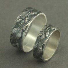 Oak Band Set Silver Wedding Bands His and Hers Rings Fall Acorn Rings Oak Leaf Embossed Fall Wedding Rings Woodland Wedding Bands Autumn This lovely set is perfect for an Autumn wedding or just for the couple that loves an adventure! Our modern lives are hectic and we are inundated with so much technology that it's easy to think we are separate from nature. We understand that it can be difficult to take the time to get back to nature, and our sterling Oaken Band offers you a way to take it with Wedding Rings Couple Silver, Nature-inspired Engraved Wedding Rings, Acorn Rings, Fall Wedding Ring, Wedding Bands His And Hers, His And Hers Rings, Fall Acorns, Bamboo Hoop Earrings, Fall Rings