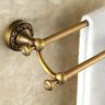 a close up view of a gold towel ring