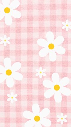 a pink and white checkered table cloth with daisies on the front, yellow center