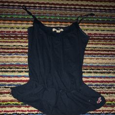 Navy Blue Hollister Tank Tags Size Large Fits Size Small/Medium Exactly As Pictured Casual Navy Stretch Tops, Navy Stretch Tops For Summer, Navy Sleeveless Top For Vacation, Navy Sleeveless Top For Day Out, Navy Cotton Tank Top For Spring, Navy Casual Cotton Tank Top, Casual Navy Cotton Tank Top, Navy Top For Spring Loungewear, Casual Blue Tank Top For Day Out