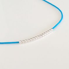 Minimalist, wearable and delicate silver multicolor thread bracelet available in several colors. Length: 20cm adjustable knot. Width: 2mm. Fully adjustable, Handmade in Spain. More colors available in this product => https://www.etsy.com/listing/845364478/tiny-simple-cord-sterling-silver-wish Ideal for a gift and for combinate with other bracelets. All our products are presented in a white organza bag. ♡ Made with love in Valencia ♡ ----------------------------- Discover the NICTE bracelets c Bracelet Thread, Stacking Jewelry, Thread Bracelet, Miyuki Bracelet, Bracelet Stacking, Adjustable Knot, Lucky Bracelet, Thread Bracelets, Bracelet Minimalist