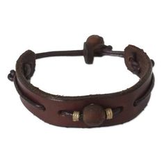 Men's Modern Leather Wristband Bracelet - Brown Standout | NOVICA Vintage Brown Adjustable Leather Bracelet, Brown Leather Bracelet With Adjustable Band, Brown Leather Strap Bracelet, Adjustable Brown Leather Jewelry, Adjustable Brown Leather Bracelet With Waxed Finish, Adjustable Brown Leather Strap Jewelry, Rustic Adjustable Leather Strap Bracelets, Handmade Brown Leather Bracelet Adjustable Fit, Brown Adjustable Band Bracelet Jewelry