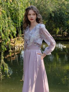 The blouse and skirt resemble morning mist, with the soft sunlight filtering through, slowly announcing the approach of dawn.
 The skirt's delicate color is reminiscent of a lotus blooming in the morning dew.
 It's a transparent setup that exudes a mysterious atmosphere and seems as if it could disappear at any moment.

 ＜Item＞


 blouse

 Strap Skirt




 <Size>


 blouse



 Small size



 Length: 54cm

 Shoulder width: 35cm

 Bust: 90cm

 Waist: 90cm

 Sleeve length: 60cm




 Medium size Formal Purple Summer Blouse, Elegant Lavender V-neck Blouse, Elegant Purple Chiffon Blouse, Elegant Lavender Skirt For Spring, Elegant Lavender Blouse For Spring, Lotus Blooming, Light Purple Flowers, Strap Skirt, Morning Mist