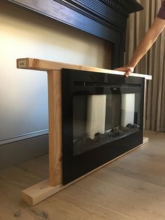 Electric Fireplace Hanging On Wall, Old Mantel With Electric Fireplace, Diy Insert Fireplace, How To Frame Out A Fireplace, Ikea Diy Fireplace, Diy Changable Art Frame, Electric Fireplace With Mantle Diy, Electric Fireplace In Basement Ideas, Insert Electric Fireplace